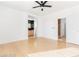 Bright bedroom with wood floors and ensuite bathroom at 10227 Sunset Gardens Dr, Las Vegas, NV 89135