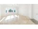 Spacious primary bedroom with tile floor, neutral paint, and bright natural light at 10227 Sunset Gardens Dr, Las Vegas, NV 89135