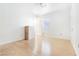 A bright bedroom features light-colored walls, wood flooring, and a built-in closet at 10227 Sunset Gardens Dr, Las Vegas, NV 89135