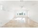 Spacious primary bedroom with tile floor, neutral paint, and bright natural light at 10227 Sunset Gardens Dr, Las Vegas, NV 89135