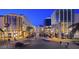 Community featuring pedestrian walkways, retail stores and manicured landscaping create a vibrant community at 10227 Sunset Gardens Dr, Las Vegas, NV 89135