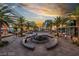 Community featuring palm trees, pedestrian walkways and a decorative water feature create a vibrant community at 10227 Sunset Gardens Dr, Las Vegas, NV 89135