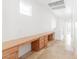 Open hallway features built-in desk and drawers, with natural light and tiled flooring at 10227 Sunset Gardens Dr, Las Vegas, NV 89135
