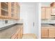Pantry features built-in cabinets and countertops for storage and food prep at 10227 Sunset Gardens Dr, Las Vegas, NV 89135