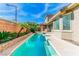Backyard oasis featuring a pool and mature landscaping at 10227 Sunset Gardens Dr, Las Vegas, NV 89135