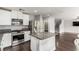 Bright kitchen featuring modern stainless steel appliances and granite countertops at 10805 Knickerbocker Ave, Las Vegas, NV 89166