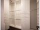 Walk-in closet with custom shelving, drawers, and ample storage space, offering luxury organization solutions at 11119 River Hills Ln, Las Vegas, NV 89135
