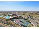 Overhead of the pool, tennis courts, and clubhouse in a Primary-planned community at 11181 Luna Blanca Dr, Las Vegas, NV 89138
