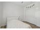 Bright bedroom featuring a modern ceiling fan, hardwood floors, and a closet at 11181 Luna Blanca Dr, Las Vegas, NV 89138