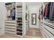 Walk-in closet with built in shelving for clothes and accessories at 11181 Luna Blanca Dr, Las Vegas, NV 89138