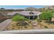 Charming single-story home with desert landscaping and mountain views in the background at 11181 Luna Blanca Dr, Las Vegas, NV 89138
