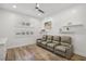 Cozy living room features a ceiling fan, recessed lighting, and comfortable seating with reclining chairs at 11181 Luna Blanca Dr, Las Vegas, NV 89138