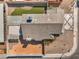 Aerial view of the home's roof, small turf yard, patio, and xeriscaped area at 1209 Shifting Sands Dr, Las Vegas, NV 89108