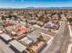 Pleasant single-Gathering home with low maintenance backyard, complemented by lush trees and covered parking at 1209 Shifting Sands Dr, Las Vegas, NV 89108