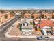 Charming single-Gathering home featuring a well-kept yard, complemented by desert landscaping and a two-car garage at 1209 Shifting Sands Dr, Las Vegas, NV 89108