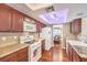 Functional kitchen with modern appliances and a view of the dining room at 1209 Shifting Sands Dr, Las Vegas, NV 89108