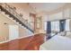 Open living room with hardwood floors, high ceilings and ample natural light at 1209 Shifting Sands Dr, Las Vegas, NV 89108