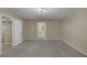 Spacious bedroom with modern light fixture, carpet and neutral paint at 141 Fox Lake Ave, Las Vegas, NV 89148