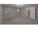 Bedroom with neutral colored walls, light fixture and carpeting at 141 Fox Lake Ave, Las Vegas, NV 89148