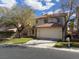 Charming two-story home with a well-manicured lawn and a spacious two-car garage at 141 Fox Lake Ave, Las Vegas, NV 89148