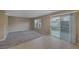 Open living space with sliding glass doors, seamlessly blending indoor and outdoor living at 141 Fox Lake Ave, Las Vegas, NV 89148