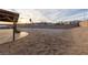 Large backyard featuring a spacious sand area perfect for landscaping or building your dream oasis at 1892 Maricopa Dr, Laughlin, NV 89029