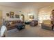 Inviting living room with carpeted floors and comfortable seating area at 1892 Maricopa Dr, Laughlin, NV 89029
