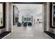 Stunning foyer with tall ceilings, gorgeous chandeliers, and sleek tile flooring at 20 Pebble Hills Ct, Las Vegas, NV 89141