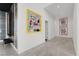 Hallway featuring modern art and patterned wallpaper at 20 Pebble Hills Ct, Las Vegas, NV 89141