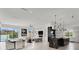 Open-concept living room features a dining area and a large window with lots of natural light at 20 Pebble Hills Ct, Las Vegas, NV 89141