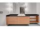 Bright bathroom with light cabinets, modern fixtures, and tiled shower at 200 Hoover Ave # 1507, Las Vegas, NV 89101