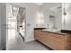 Bright bathroom with light cabinets, modern fixtures and access to the home at 200 Hoover Ave # 1507, Las Vegas, NV 89101