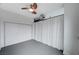 Modern bedroom boasts closet, ceiling fan, and unique exposed ductwork design at 200 Hoover Ave # 1507, Las Vegas, NV 89101