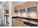 Modern kitchen features stainless steel appliances and wood cabinets at 200 Hoover Ave # 1507, Las Vegas, NV 89101