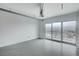 Bright room featuring a large window with expansive city views at 200 Hoover Ave # 1507, Las Vegas, NV 89101