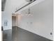 Bright living room with modern lighting and concrete floors at 200 Hoover Ave # 1507, Las Vegas, NV 89101