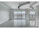 Bright, open living area featuring large windows offering expansive city views at 200 Hoover Ave # 1507, Las Vegas, NV 89101
