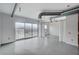 Spacious room with large windows and city views, and exposed ductwork at 200 Hoover Ave # 1507, Las Vegas, NV 89101