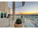 Elegant rooftop terrace featuring stunning city views, lush greenery, and serene lounge areas at 200 Hoover Ave # 1507, Las Vegas, NV 89101