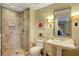 Bathroom featuring single sink vanity and glass enclosed shower at 2000 N Fashion Show Dr # 3921, Las Vegas, NV 89109
