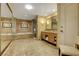Bathroom boasts marble finishes, soaking tub and vanity at 2000 N Fashion Show Dr # 3921, Las Vegas, NV 89109