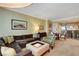Inviting living room with comfortable seating, a dining area, and a view of the modern kitchen at 2000 N Fashion Show Dr # 3921, Las Vegas, NV 89109