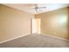 Spacious bedroom with carpet and neutral walls features a ceiling fan at 2186 Savannah River St, Henderson, NV 89044