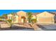 Beautiful single-story home with a desert landscape and attached two car garage at 2186 Savannah River St, Henderson, NV 89044
