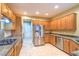 Bright kitchen featuring stainless steel appliances, granite countertops, and ample cabinet space at 2186 Savannah River St, Henderson, NV 89044