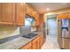 Close-up view of kitchen with stainless steel appliances and granite countertops at 2186 Savannah River St, Henderson, NV 89044