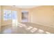 Bright living room with tile flooring, neutral paint and plantation shutters at 2186 Savannah River St, Henderson, NV 89044