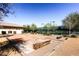Charming bocce ball court featuring a rustic aesthetic with wooden accents, set in a peaceful recreational area at 2384 Yellow Bird Ct, North Las Vegas, NV 89084