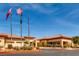 Community clubhouse showcasing attractive architecture, professional landscaping, and ample parking at 2384 Yellow Bird Ct, North Las Vegas, NV 89084