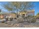 Attractive single-story house with a well-maintained xeriscaped front yard at 2384 Yellow Bird Ct, North Las Vegas, NV 89084
